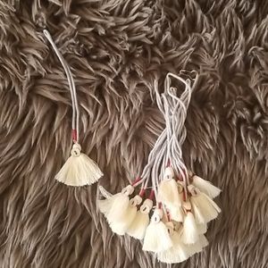 Johnny was cream & gray tassels